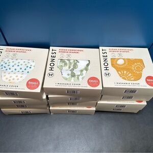 The Honest Company cloth baby diapers Green, Orange, Blue 12 for $80.